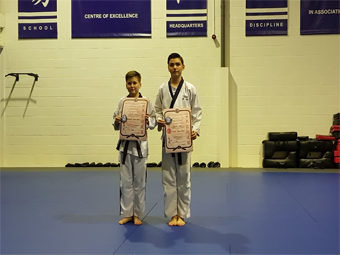 Nathan and Pierce achieve black belt grading - Christian Brothers